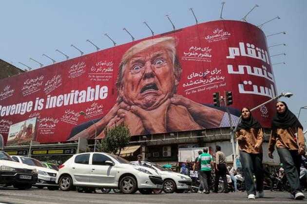 Giant revenge billboard targeting Trump erected in central Tehran TEHRAN, IRAN – JULY 28: A view of a giant billboard depicting U.S. President Donald Trump with the words Revenge Is Inevitable displayed at the intersection of Jomhuri Street and Vali-e Asr Street in Tehran, Iran, on July 28, 2026. Fatemeh Bahrami Anadolu Tehran Iran. Editorial use only. Please get in touch for any other usage.  Copyright: x2026xAnadoluxFatemehxBahramix