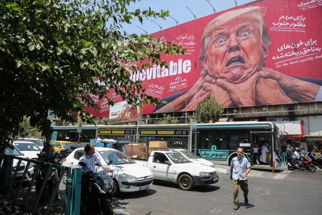 Giant revenge billboard targeting Trump erected in central Tehran TEHRAN, IRAN – JULY 28: A view of a giant billboard depicting U.S. President Donald Trump with the words Revenge Is Inevitable displayed at the intersection of Jomhuri Street and Vali-e Asr Street in Tehran, Iran, on July 28, 2026. Fatemeh Bahrami Anadolu Tehran Iran. Editorial use only. Please get in touch for any other usage.  Copyright: x2026xAnadoluxFatemehxBahramix