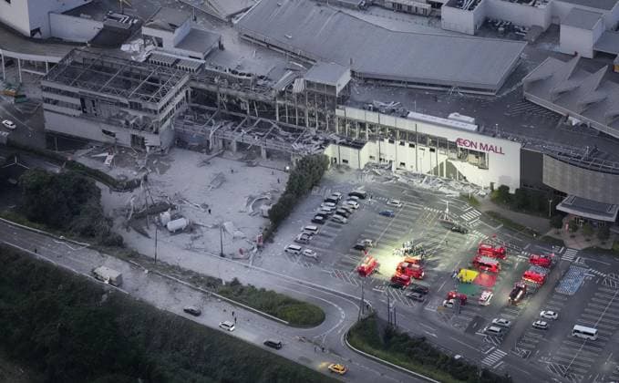 Strong quake jolts southwestern Japan Photo taken from a Kyodo News helicopter on July 28, 2026, shows search and rescue operations at a partially destroyed Aeon Mall building in Kashima, Kumamoto Prefecture, following an explosion after an earthquake with a preliminary magnitude of 7.1 shook the southwestern Japan prefecture. Many people are feared trapped inside the building.  A14AA0005624322P