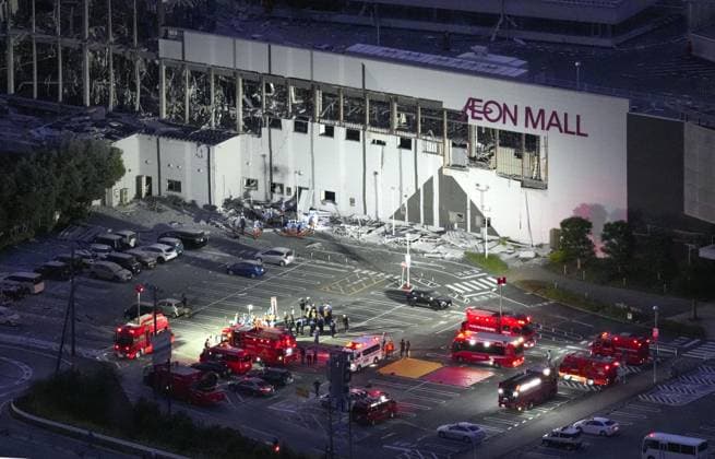 Strong quake jolts southwestern Japan Photo taken from a Kyodo News helicopter on July 28, 2026, shows search and rescue operations at a partially destroyed Aeon Mall building in Kashima, Kumamoto Prefecture, following an explosion after an earthquake with a preliminary magnitude of 7.1 shook the southwestern Japan prefecture. Many people are feared trapped inside the building.  A14AA0005624324P