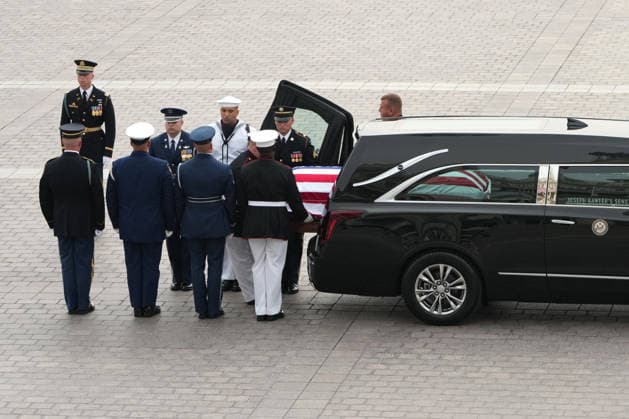 An Armed Forces Body Bearer Team moves the casket of Sen. Lindsey Graham, R-S.C., upon arrival for a Congressional tribute in the Rotunda of the U.S. Capitol, Tuesday, July 28, 2026, in Washington. Graham, who served in Congress for 31 years, died on July 11 at the age of 71. Pool photo by Mark Schiefelbein  WAX20260728705 MarkxSchiefelbein