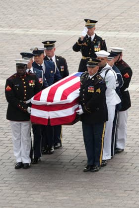 An Armed Forces Body Bearer Team moves the casket of Sen. Lindsey Graham, R-S.C., upon arrival for a Congressional tribute in the Rotunda of the U.S. Capitol, Tuesday, July 28, 2026, in Washington. Graham, who served in Congress for 31 years, died on July 11 at the age of 71. Pool photo by Mark Schiefelbein  WAX20260728707 MarkxSchiefelbein