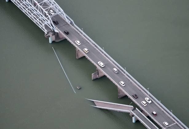 Strong quake jolts southwestern Japan+ Photo taken from a Kyodo News helicopter on July 28, 2026, shows a partially collapsed bridge in Yatsushiro, Kumamoto Prefecture, after a magnitude 7.1 earthquake shook the southwestern Japan prefecture.  A14AA0005624339P
