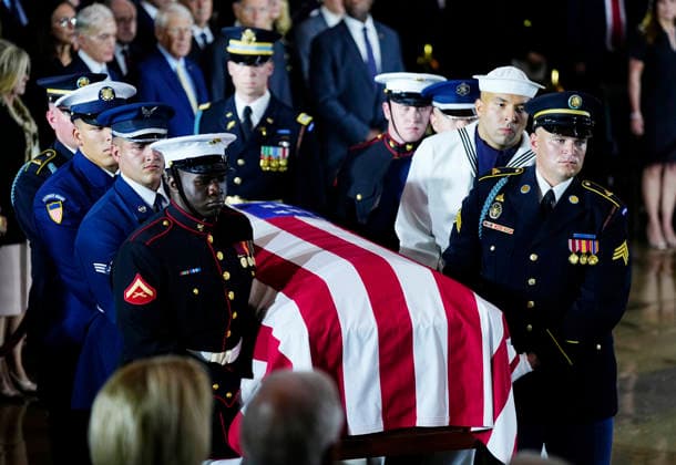 An Armed Forces Body Bearer Team moves the casket of Sen. Lindsey Graham, R-SC, into the Rotunda for a Congressional tribute in the Rotunda of the U.S. Capitol in Washington DC on Tuesday, July 28, 2026. Graham, who served in Congress for 31 years, died on July 11 at the age of 71.  WAP20260728909 BONNIExCASH