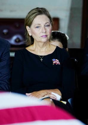 Sen. Darline Graham, R-SC, sister of the late Sen. Lindsey Graham, watches as an Armed Forces Body Bearer Team moves the casket of her brother into the Rotunda for a Congressional tribute in the Rotunda of the U.S. Capitol in Washington DC on Tuesday, July 28, 2026. Lindsey Graham, who served in Congress for 31 years, died on July 11 at the age of 71.  WAP20260728914 BONNIExCASH