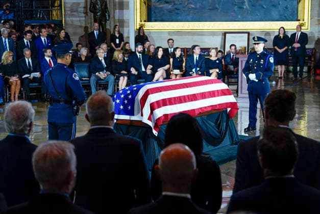 U.S. Capitol Police stand watch over the casket of the late Sen. Lindsey Graham during a Congressional tribute in the Rotunda of the U.S. Capitol in Washington DC on Tuesday, July 28, 2026. Graham, who served South Carolina in Congress for 31 years, died on July 11 at the age of 71.  WAP20260728917 BONNIExCASH