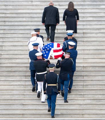 Sen. Lindsey Graham Congressional Tribute UNITED STATES - JULY 28: The Armed Forces Body Bearer Team carries the body of Sen. Lindsey Graham, R-S.C., up the U.S. Capitol steps to the Congressional tribute in the U.S. Capitol Rotunda on Tuesday, July 28, 2026. Sen. Lindsey Graham died on July 11th from an aortic dissection. (Bill Clark CQ Roll Call) Washington DC United States EDITORIAL USE ONLY Copyright: x 2026xCQxRollxCallx BillxClarkx rollcallpix172255