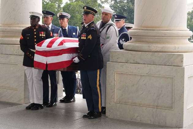 An Armed Forces Body Bearer Team moves the casket of Sen. Lindsey Graham, R-S.C., upon arrival for a Congressional tribute in the Rotunda of the U.S. Capitol, Tuesday, July 28, 2026, in Washington. Graham, who served in Congress for 31 years, died on July 11 at the age of 71. Pool photo by Mark Schiefelbein  WAX2026072870998 MarkxSchiefelbein