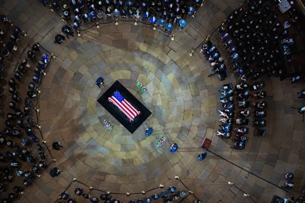 The casket of the late Sen. Lindsey Graham lies in the Rotunda of the U.S. Capitol during a Congressional tribute in Washington DC on Tuesday, July 28, 2026. Graham, who served South Carolina in Congress for 31 years, died on July 11 at the age of 71. Pool  WASP20260728102 KENNYxHOLSTON