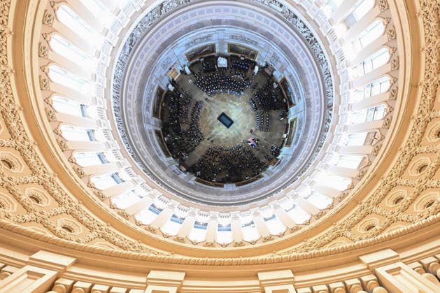 The casket of the late Sen. Lindsey Graham lies in the Rotunda of the U.S. Capitol during a Congressional tribute in Washington DC on Tuesday, July 28, 2026. Graham, who served South Carolina in Congress for 31 years, died on July 11 at the age of 71. Pool  WASP20260728104 KENNYxHOLSTON