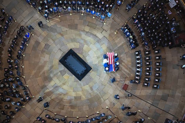 The casket of the late Sen. Lindsey Graham lies in the Rotunda of the U.S. Capitol during a Congressional tribute in Washington DC on Tuesday, July 28, 2026. Graham, who served South Carolina in Congress for 31 years, died on July 11 at the age of 71. Pool  WASP20260728106 KENNYxHOLSTON