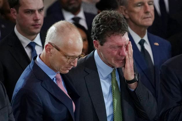 Sen. Saxby Chambliss, R-GA, consoles Richard Perry, longtime chief of staff to late Sen. Lindsey Graham, during a Congressional Tribute to honor Graham in the Rotunda of the U.S. Capitol in Washington, DC on Tuesday, July 28, 2026. REUTERS Nathan Howard Pool  WAX20260728961 NathanxHoward