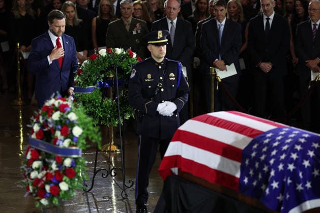 July 28, 2026, Washington, District Of Columbia, USA: WASHINGTON, DC - JULY 28: U.S. Vice President JD Vance pays his respects over the casket during a memorial tribute for the late U.S. Sen. Lindsey Graham (R-SC) in the Rotunda of the U.S. Capitol on July 28, 2026 in Washington, DC. Graham, who was elected to the Senate in 2002, died suddenly on July 11th from an aortic dissection. He was 71 years old Washington USA  - ZUMAs152 20260728_faa_s152_116 Copyright: xWinxMcNameex-xPoolxviaxCNPx