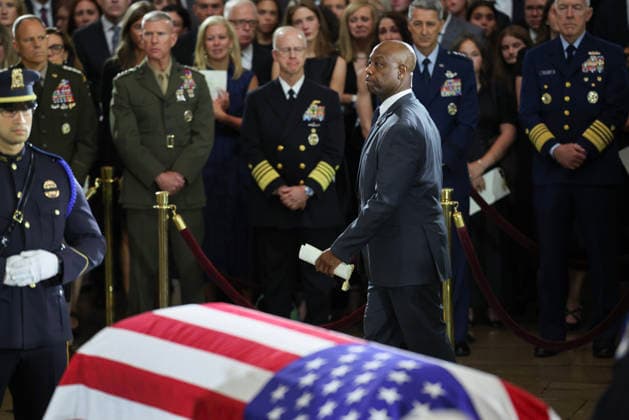 July 28, 2026, Washington, District Of Columbia, USA: WASHINGTON, DC - JULY 28: U.S. Sen. Tim Scott (R-SC) pays his respects during a memorial tribute for the late U.S. Sen. Lindsey Graham (R-SC) in the Rotunda of the U.S. Capitol on July 28, 2026 in Washington, DC. Graham, who was elected to the Senate in 2002, died suddenly on July 11th from an aortic dissection. He was 71 years old Washington USA - ZUMAs152 20260728_faa_s152_122 Copyright: xWinxMcNameex-xPoolxviaxCNPx