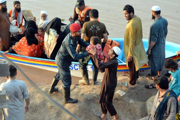 RECORD DATE NOT STATED Rescue officials are busy in relief and rescue operation to help people affected by flash flood due to heavy downpour, at Pathan Colony Tehsil Ferozwala near Lahore on Tuesday, July 28, 2026. Three children from the same family drowned after a canal embankment broke in Ferozwala Pathan Colony, bringing the death toll from ongoing monsoon rains across affected regions to 32, according to the PDMA. (Babar Shah PPI Images). EDITORIAL USE ONLY Copyright: xx AR-ZM-280726x ppiphotos484140