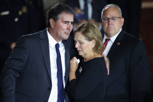 Lindsey Graham Memorial Service in the US Capitol WASHINGTON, DC - JULY 28: U.S. Sen. Darline Graham Nordone (R-SC) (C) is embraced by her husband Larry Nordone (L) after paying their respects over the casket during memorial tribute for the late U.S. Sen. Lindsey Graham (R-SC) in the Rotunda of the U.S. Capitol on July 28, 2026 in Washington, DC. Graham, who was elected to the Senate in 2002, died suddenly on July 11th from an aortic dissection. He was 71 years old. Photo by Win McNamee Pool via CNP ABACAPRESS.COM Washington District of Columbia United States  Copyright: xCNP ABACAx