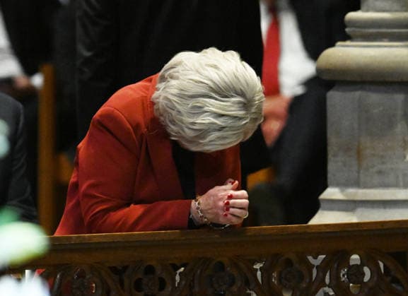 White House Chief of Staff is Susie Wiles prays during the funeral service for the late Sen. Lindsey Graham, R-SC, at Washington National Cathedral in Washington, DC on Tuesday, July 28, 2026.  WAP20260728809 ANNABELLExGORDON