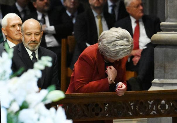 White House Chief of Staff is Susie Wiles prays during the funeral service for the late Sen. Lindsey Graham, R-SC, at Washington National Cathedral in Washington, DC on Tuesday, July 28, 2026.  WAP20260728810 ANNABELLExGORDON