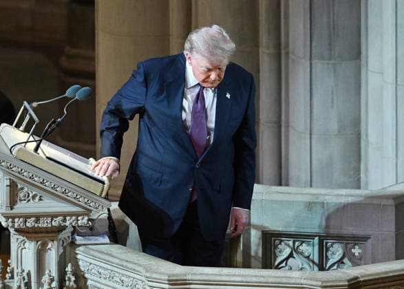 President Donald Trump steps down from the pulpit after delivering the eulogy at the funeral for Sen. Lindsey Graham, R-SC, at the National Cathedral in Washington DC on Tuesday, July 28, 2026. Graham, who served in Congress for 31 years, died on July 11 at the age of 71.  WAP20260728816 ANNABELLExGORDON