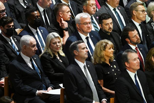 President Volodymyr Zelensky of Ukraine and Foreign Minister Andriii Sybiha sit with Prime Minister Benjamin Netanyahu of Israel at the funeral for Sen. Lindsey Graham, R-SC, at the National Cathedral in Washington DC on Tuesday, July 28, 2026. Graham, who served in Congress for 31 years, died on July 11 at the age of 71.  WAP20260728819 ANNABELLExGORDON