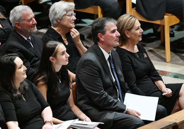 Sen. Darline Graham, R-SC, (R), her husband Larry Nordone and family members listen to tributes at the funeral for Sen. Lindsey Graham, R-SC, at the National Cathedral in Washington DC on Tuesday, July 28, 2026. Graham, who served in Congress for 31 years, died on July 11 at the age of 71.  WAP20260728818 ANNABELLExGORDON
