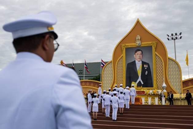 July 28, 2026, Bangkok, Thailand: Thai officials wait for a queue to give their respect in front of a portrait of the King Vajiralongkorn during his 74th birthday celebration..Thai authorities held a celebration to mark the 74th birthday of King Maha Vajiralongkorn at Sanam Luang. Bangkok Thailand  - ZUMAs197 20260728_aaa_s197_085 Copyright: xPeeraponxBoonyakiatx