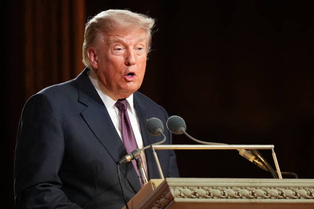 President Donald Trump speaks at the funeral of Sen. Lindsey Graham, R-SC., at the Washington National Cathedral, Tuesday, July 28, 2026, in Washington.  WAX2026072601 AlexxBrandon