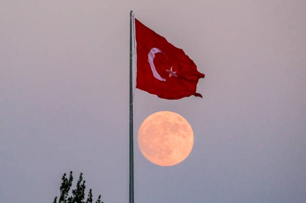 Full moon behind Turkish flag in Karaman KARAMAN, TURKIYE - JULY 28: The full moon rises behind a Turkish flag in Karaman, Turkiye, on July 28, 2026. Omer Tarsuslu Anadolu Karaman Turkey. Editorial use only. Please get in touch for any other usage.  Copyright: x2026xAnadoluxOmerxTarsuslux