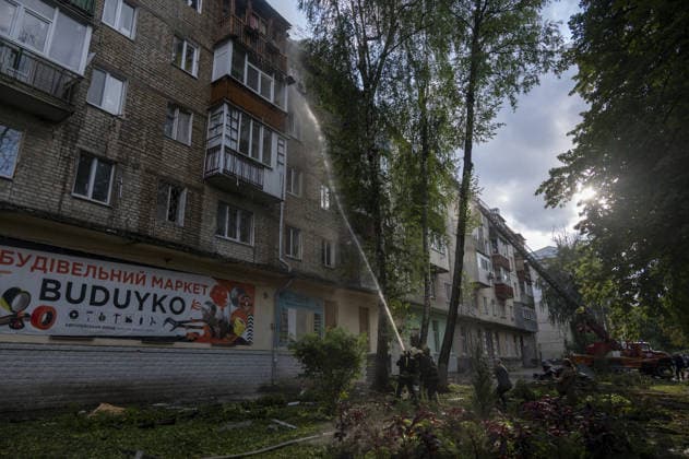 Russian drone attack in Kharkiv KHARKIV, UKRAINE - JULY 28: Russian Shahed type jet-powered UAV struck the roof of a five-story residential building in Kharkiv, Ukraine on July 28, 2026. A fire broke out on the roof, damaging about half of its area. Eight local residents suffered acute stress reactions. In addition, five nearby high-rise buildings were damaged, with windows shattered, as well as private homes and power lines. Serhii Masin Anadolu Kharkiv Ukraine. Editorial use only. Please get in touch for any other usage.  Copyright: x2026xAnadoluxSerhiixMasinx