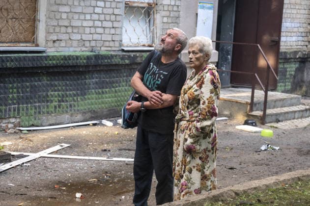 Russian drone attack in Kharkiv KHARKIV, UKRAINE - JULY 28: Russian Shahed type jet-powered UAV struck the roof of a five-story residential building in Kharkiv, Ukraine on July 28, 2026. A fire broke out on the roof, damaging about half of its area. Eight local residents suffered acute stress reactions. In addition, five nearby high-rise buildings were damaged, with windows shattered, as well as private homes and power lines. Serhii Masin Anadolu Kharkiv Ukraine. Editorial use only. Please get in touch for any other usage.  Copyright: x2026xAnadoluxSerhiixMasinx