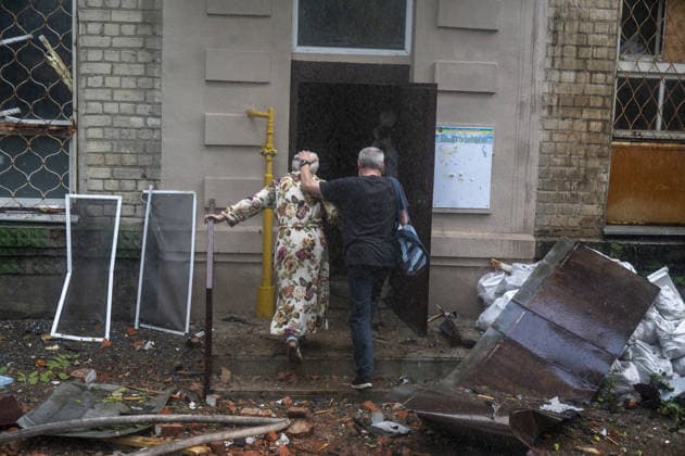 Russian drone attack in Kharkiv KHARKIV, UKRAINE - JULY 28: Russian Shahed type jet-powered UAV struck the roof of a five-story residential building in Kharkiv, Ukraine on July 28, 2026. A fire broke out on the roof, damaging about half of its area. Eight local residents suffered acute stress reactions. In addition, five nearby high-rise buildings were damaged, with windows shattered, as well as private homes and power lines. Serhii Masin Anadolu Kharkiv Ukraine. Editorial use only. Please get in touch for any other usage.  Copyright: x2026xAnadoluxSerhiixMasinx
