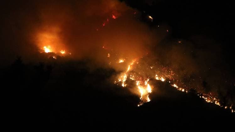 Crews battle forest fire in Antalya’s Kas district KAS, ANTALYA, TURKIYE - JULY 28: Flames and smoke rise from a forest fire as crews continue ground operations into the evening in the Kas district of Antalya, Turkiye, on July 28, 2026. Talip Demirci Anadolu Antalya Turkey. Editorial use only. Please get in touch for any other usage.  Copyright: x2026xAnadoluxTalipxDemircix