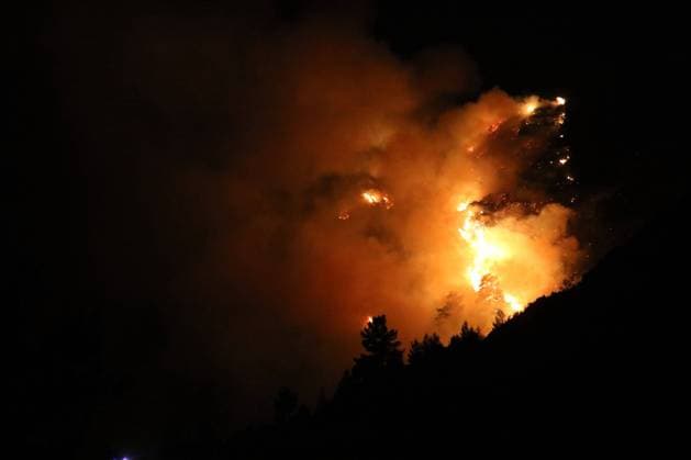 Crews battle forest fire in Antalya’s Kas district KAS, ANTALYA, TURKIYE - JULY 28: Flames and smoke rise from a forest fire as crews continue ground operations into the evening in the Kas district of Antalya, Turkiye, on July 28, 2026. Talip Demirci Anadolu Antalya Turkey. Editorial use only. Please get in touch for any other usage.  Copyright: x2026xAnadoluxTalipxDemircix