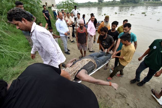 NEW DELHI, INDIA - JULY 28: Delhi Police personnel conduct a search and rescue operation after four people drowned in the Yamuna River near Geeta Colony, on July 28, 2026 in New Delhi, India. Two bodies have been recovered so far, while rescue teams continue efforts to trace the remaining two men amid the river™s swollen water level and strong current, which have made the operation challenging. (Photo by Ishant Chauhan Hindustan Times) 2 Dead, 2 Missing After Four Drowned In Yamuna In East Delhi