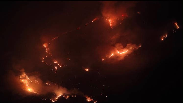 Crews battle forest fire in Antalya’s Kas district KAS, ANTALYA, TURKIYE - JULY 28: Flames and smoke rise from a forest fire as crews continue ground operations into the evening in the Kas district of Antalya, Turkiye, on July 28, 2026. Talip Demirci Anadolu Antalya Turkey. Editorial use only. Please get in touch for any other usage.  Copyright: x2026xAnadoluxTalipxDemircix