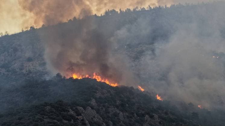 Crews battle forest fire in Antalya’s Kas district KAS, ANTALYA, TURKIYE - JULY 29: Flames and smoke rise from a forest fire as crews continue ground operations on the second day, in Kas district of Antalya, Turkiye, on July 29, 2026. Talip Demirci Anadolu Antalya Turkey. Editorial use only. Please get in touch for any other usage.  Copyright: x2026xAnadoluxTalipxDemircix