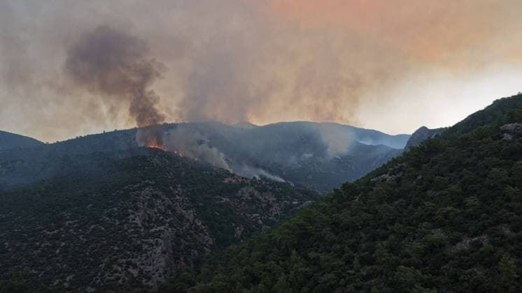 Crews battle forest fire in Antalya’s Kas district KAS, ANTALYA, TURKIYE - JULY 29: Flames and smoke rise from a forest fire as crews continue ground operations on the second day, in Kas district of Antalya, Turkiye, on July 29, 2026. Talip Demirci Anadolu Antalya Turkey. Editorial use only. Please get in touch for any other usage.  Copyright: x2026xAnadoluxTalipxDemircix