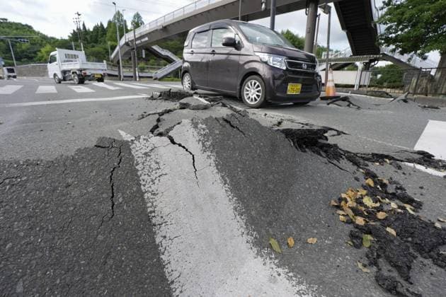 Aftermath of strong earthquake in Kumamoto Photo taken on July 29, 2026, shows a damaged road in Hikawa, Kumamoto Prefecture, a day after a powerful earthquake hit the southwestern Japan prefecture.  A14AA0005624393P