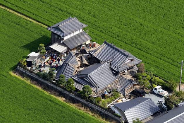 Aftermath of strong earthquake in Kumamoto Photo taken from a Kyodo News helicopter on July 29, 2026, shows search and rescue operations at a collapsed house in Hikawa, Kumamoto Prefecture, a day after a powerful earthquake hit the southwestern Japan prefecture.  A14AA0005624416P