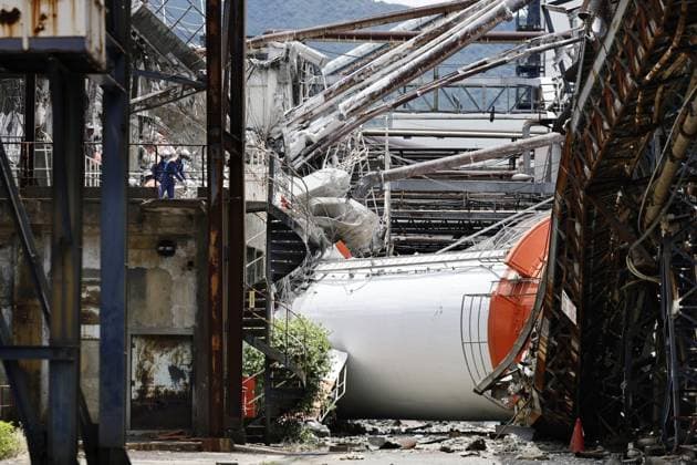 CORRECTED: Aftermath of strong earthquake in Kumamoto Photo taken on July 29, 2026, shows a Nippon Paper Industries Co. plant with its smokestack broken in Yatsushiro, Kumamoto Prefecture, following a powerful earthquake that struck the southwestern Japan prefecture and its vicinity the previous day.  A14AA0005624451P