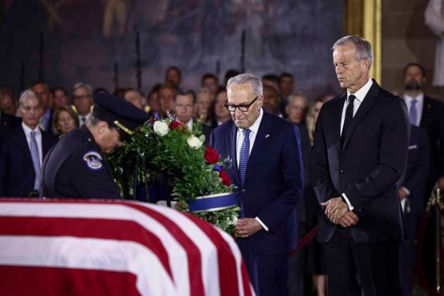 Lindsey Graham Memorial Service in the US Capitol United States Senate Minority Leader Chuck Schumer (Democrat of New York), with United States Senate Majority Leader John Thune (Republican of South Dakota), lays a wreath at the casket of the late South Carolina Senator Lindsey Graham during a congressional tribute in the rotunda of the US Capitol in Washington, DC, USA, 28 July 2026. Graham died unexpectedly on 11 July at the age of 71 from a tear in his aorta. Credit: CNP AdMedia Washington District of Columbia United States of America EDITORIAL USE ONLY  Copyright: xx CNPx xAdMediax admphotosthree008438