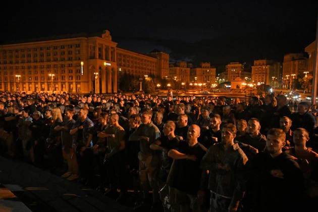 People are gathered in Maidan Nezalezhnosti Square during a commemorative ceremony marking the fourth anniversary of the Olenivka prison massacre, Kyiv, Ukraine, July 28, 2026. On the night of 28–29 July 2022, at least 53 Ukrainian prisoners of war were killed and more than 130 wounded in a Russian terrorist attack on the former Volnovakha Penal Colony No. 120 near the occupied settlement of Olenivka, Donetsk region, where defenders of Azovstal in Mariupol were being held. (Photo by Yevhen Kotenko Ukrinform) Kyiv remembers Olenivka prison massacre victims  Copyright: xYevhenxKotenkox