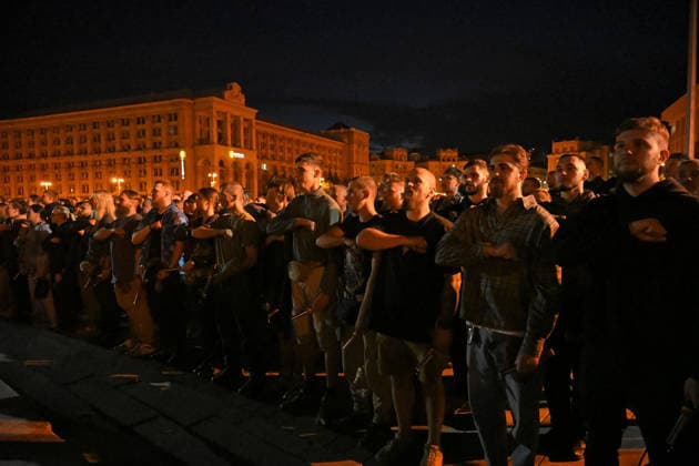 People are gathered in Maidan Nezalezhnosti Square during a commemorative ceremony marking the fourth anniversary of the Olenivka prison massacre, Kyiv, Ukraine, July 28, 2026. On the night of 28–29 July 2022, at least 53 Ukrainian prisoners of war were killed and more than 130 wounded in a Russian terrorist attack on the former Volnovakha Penal Colony No. 120 near the occupied settlement of Olenivka, Donetsk region, where defenders of Azovstal in Mariupol were being held. (Photo by Yevhen Kotenko Ukrinform) Kyiv remembers Olenivka prison massacre victims  Copyright: xYevhenxKotenkox