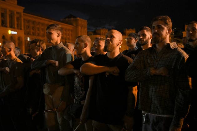 People are gathered in Maidan Nezalezhnosti Square during a commemorative ceremony marking the fourth anniversary of the Olenivka prison massacre, Kyiv, Ukraine, July 28, 2026. On the night of 28–29 July 2022, at least 53 Ukrainian prisoners of war were killed and more than 130 wounded in a Russian terrorist attack on the former Volnovakha Penal Colony No. 120 near the occupied settlement of Olenivka, Donetsk region, where defenders of Azovstal in Mariupol were being held. (Photo by Yevhen Kotenko Ukrinform) Kyiv remembers Olenivka prison massacre victims  Copyright: xYevhenxKotenkox
