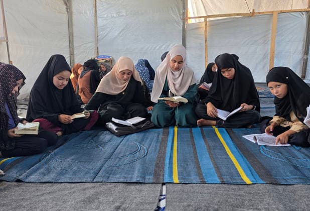 Orphaned Palestinian children attend Quran classes in Khan Younis camp Orphaned Palestinian boys and girls take part in Quran memorization and recitation classes at the Al Baraka Camp for Orphan Care in the al-Mawasi area of Khan Younis, southern Gaza Strip, on July 29, 2026. The educational sessions are held regularly to teach the Quran and strengthen the children s religious knowledge amid the difficult humanitarian conditions in the Gaza Strip. Photo by Tariq Mohammad APA Images Khan Yunis Gaza Strip Palestinian Territory 290726_Khan_Yunis_TM_00(15) Copyright: xapaimagesxTariqxMohammad xapaimagesx