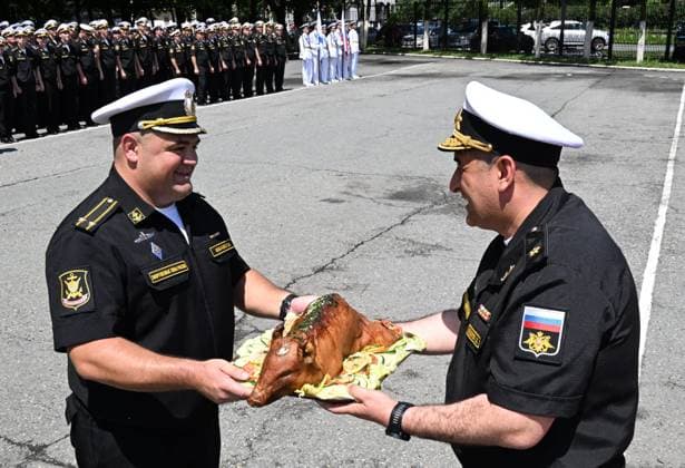 Russia China Naval Drills 9213433 29.07.2026 Commander of the Russian Pacific Fleet s Primorsky Flotilla of Diverse (Combined) Forces Rear Admiral Alexander Bagdasarov, right, welcomes Commander of the Rezky multi-role guided-missile corvette, Captain 2nd Rank Evgeny Kovalev, during a ceremony welcoming Russian and Chinese navy ships after joint patrols in the Pacific Ocean upon arrival at the port of Vladivostok, Russia. On July 28, the Russian and Chinese navies completed their sixth joint patrol in the Pacific Ocean, a mission that lasted two weeks. Vitaliy Ankov Sputnik Vladivostok Russia  Copyright: xVitaliyxAnkovx