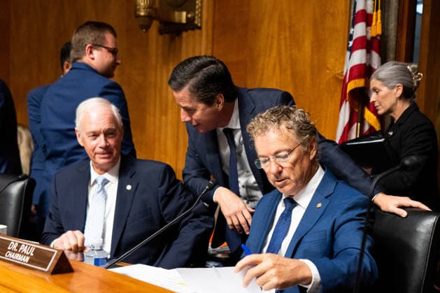 Anthony Fauci Hearing UNITED STATES - JULY 29: From left, Sen. Ron Johnson, R-Wisc., Sen. Bernie Moreno, R-Ohio, and Sen. Rand Paul, R-Ky., confer before hearing from former Director of the National Institute of Allergy and Infectious Diseases Dr. Anthony Fauci at the Senate Homeland Security and Governmental Affairs Committee hearing in the Dirksen Senate Office Building on Wednesday, July 29, 2026. (Bill Clark CQ Roll Call) Washington DC United States EDITORIAL USE ONLY Copyright: x 2026xCQxRollxCallx BillxClarkx rollcallpix172300