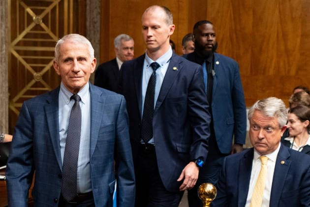 Anthony Fauci Hearing UNITED STATES - JULY 29: Former Director of the National Institute of Allergy and Infectious Diseases Dr. Anthony Fauci, left, arrives for the Senate Homeland Security and Governmental Affairs Committee hearing in the Dirksen Senate Office Building on Wednesday, July 29, 2026. Sen. Roger Marshall, R-Kan., is seated in the audience to the right. (Bill Clark CQ Roll Call) Washington DC United States EDITORIAL USE ONLY Copyright: x 2026xCQxRollxCallx BillxClarkx rollcallpix172297