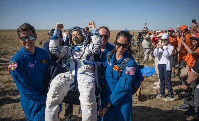 July 29, 2026, Zhezkazgan, Kazakhstan: NASA astronaut Chris Williams cheers as he is carried from the Soyuz MS-28 spacecraft moments after landing, July 26, 2026 near the town of Zhezkazgan, Kazakhstan. Williams landed with cosmonauts Sergei Mikaev and Sergey Kud-Sverchkov, after 241 days in space aboard the International Space Station. Zhezkazgan Kazakhstan - ZUMAp138 20260729_zaa_p138_016 Copyright: xBillxIngalls Nasax