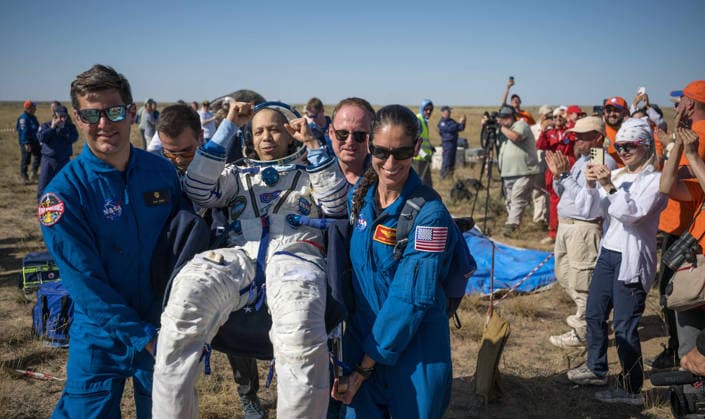 July 29, 2026, Zhezkazgan, Kazakhstan: NASA astronaut Chris Williams cheers as he is carried from the Soyuz MS-28 spacecraft moments after landing, July 26, 2026 near the town of Zhezkazgan, Kazakhstan. Williams landed with cosmonauts Sergei Mikaev and Sergey Kud-Sverchkov, after 241 days in space aboard the International Space Station. Zhezkazgan Kazakhstan - ZUMAp138 20260729_zaa_p138_027 Copyright: xBillxIngalls Nasax